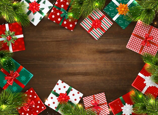 Fondo de Navidad realista con coloridas cajas de regalo y ramas de abeto en mesa de madera