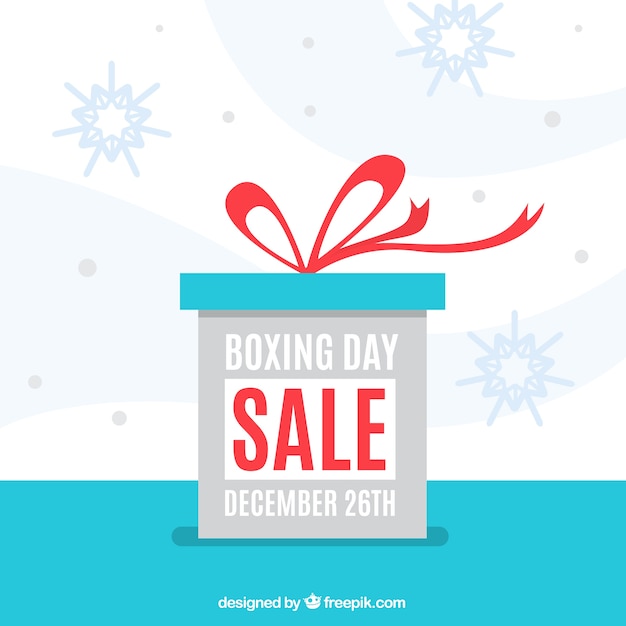 Vector gratuito fondo plano del boxing day con regalo y copos de nieve