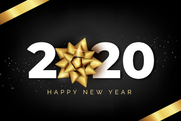 Fondo realista de año nuevo 2020 con lazo de regalo dorado