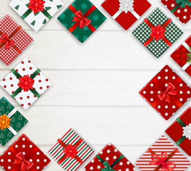 Fondo realista con patrón de cajas de navidad decoradas en mesa de madera blanca