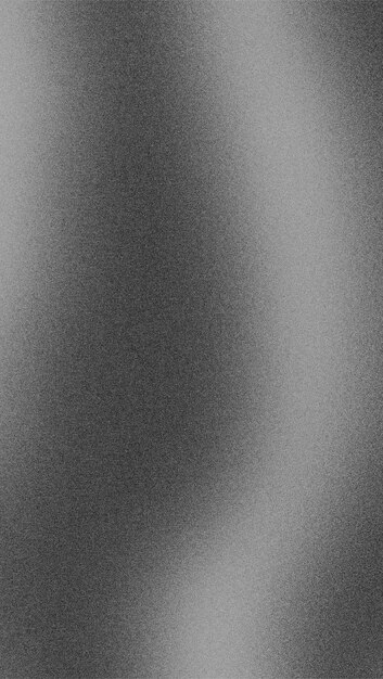 una foto en blanco y negro de una superficie metálica con un fondo plateado