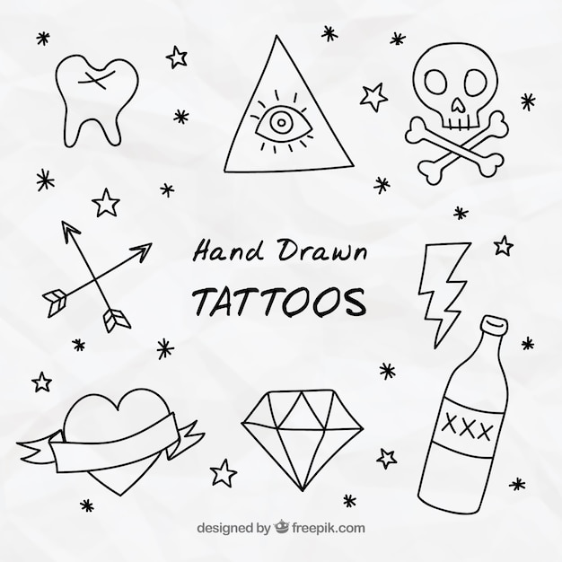Vector gratuito garabatos de tatuajes decorativos
