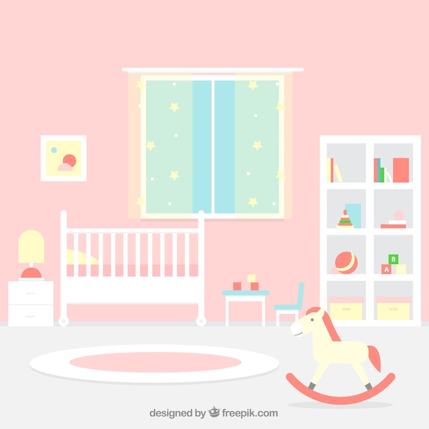 Genial habitación de bebé con pared rosa