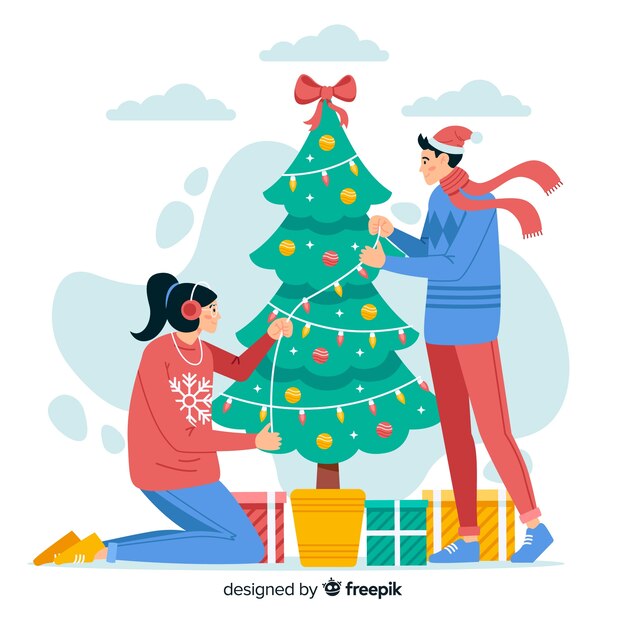 Gente decorando el árbol de navidad juntos