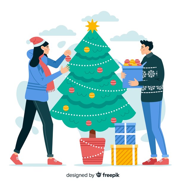 Gente decorando el árbol de navidad
