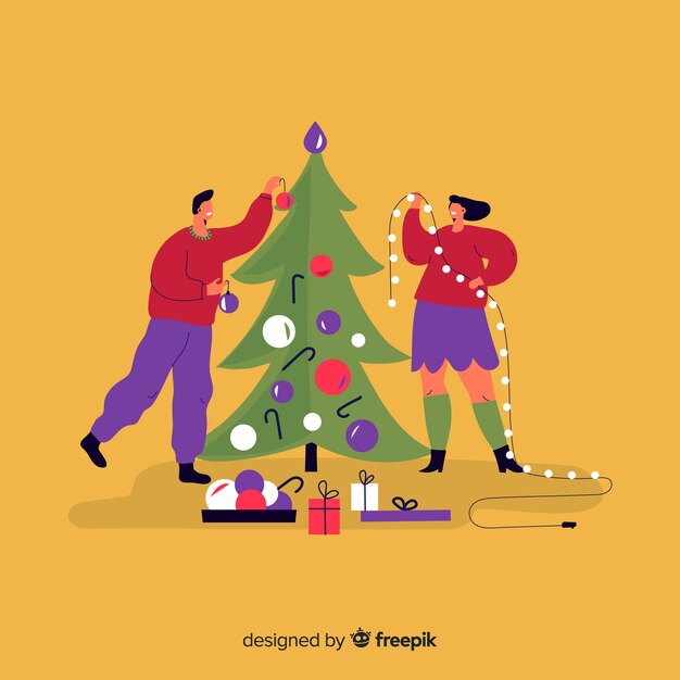 Gente decorando el árbol de navidad