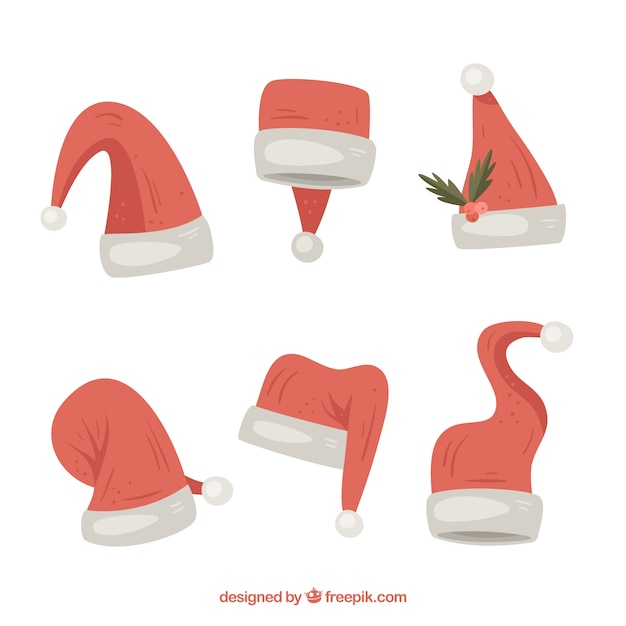 Vector gratuito gorros de navidad dibujados a mano