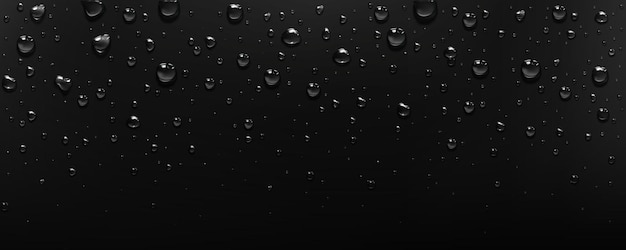 Gotas de agua pura y clara sobre fondo negro
