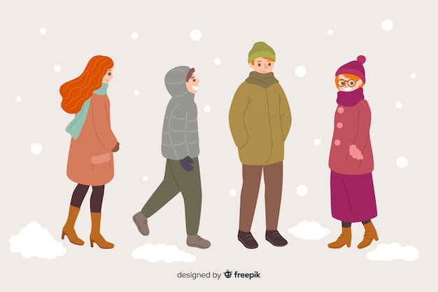 Grupo de personas caminando en ropa de invierno
