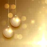 Vector gratuito hermosa tarjeta de felicitación navideña dorada con bolas