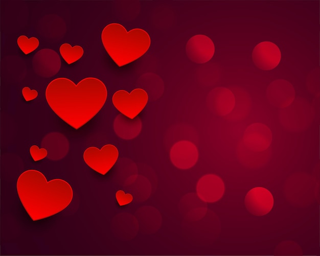 Hermoso bokeh con diseño de corazones rojos