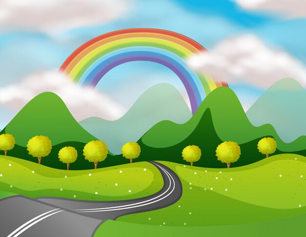 Hermoso camino de naturaleza bajo el arco iris