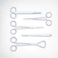 Vector gratuito herramientas médicas realistas con bisturí de tijeras de metal y pinzas en blanco aislado