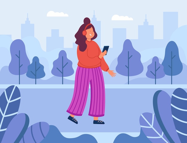 Vector gratuito hipster de dibujos animados mujer caminando en el parque de la ciudad con auriculares. chica con teléfono escuchando música al aire libre ilustración plana