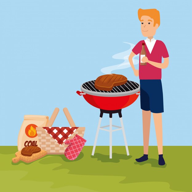 Hombre con carne en la barbacoa y cesta
