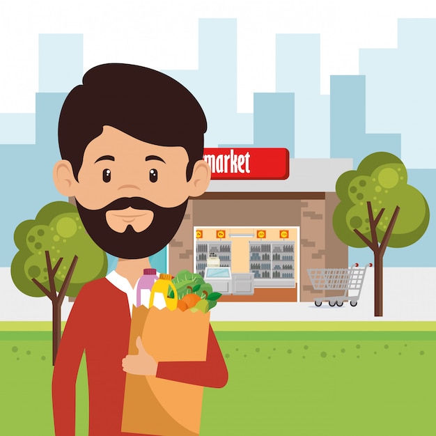 hombre con comestibles de supermercado en bolsa de compras