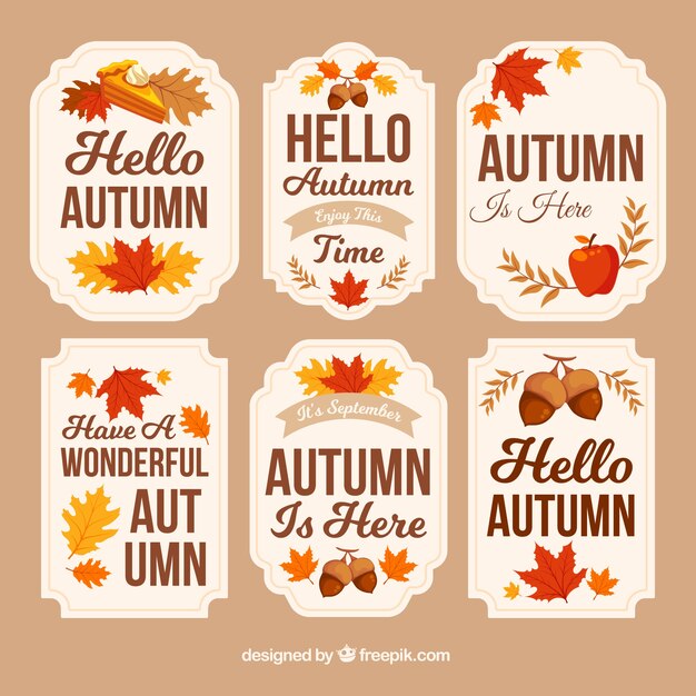 Insignias de otoño con hojas y bellotas