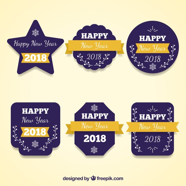 Insignias púrpuras de año nuevo con cintas amarillas