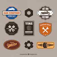 Vector gratuito insignias retro taller de coches