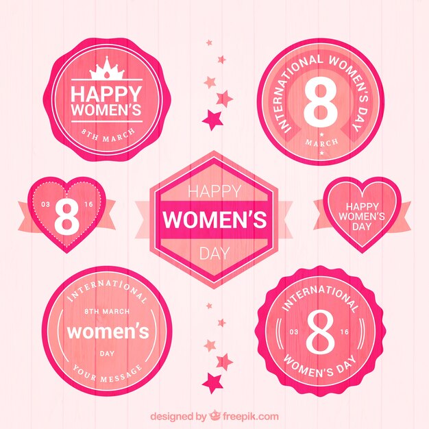 Insignias rosas vintage del día de la mujer