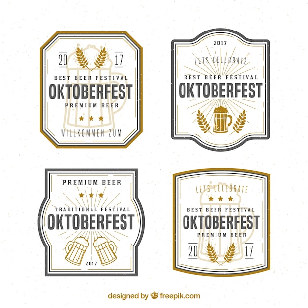 Vector gratuito insignias vintage con cervezas y  trigo