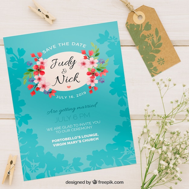 Invitación de boda azul con flores 