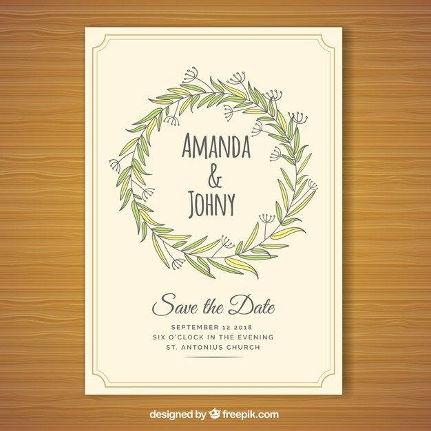 Invitación de boda bonita con corona floral decorativa