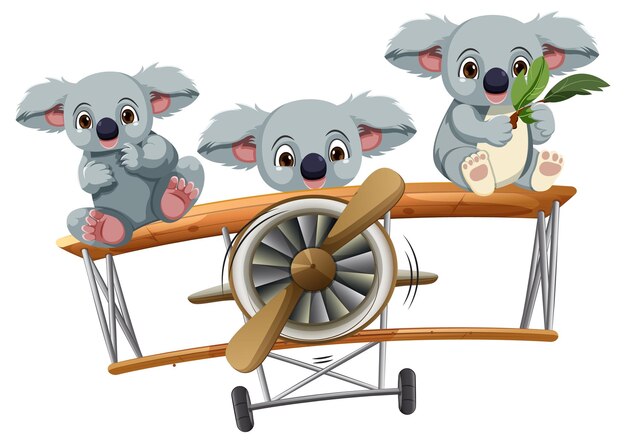 Koalas en un avión de juguete de madera