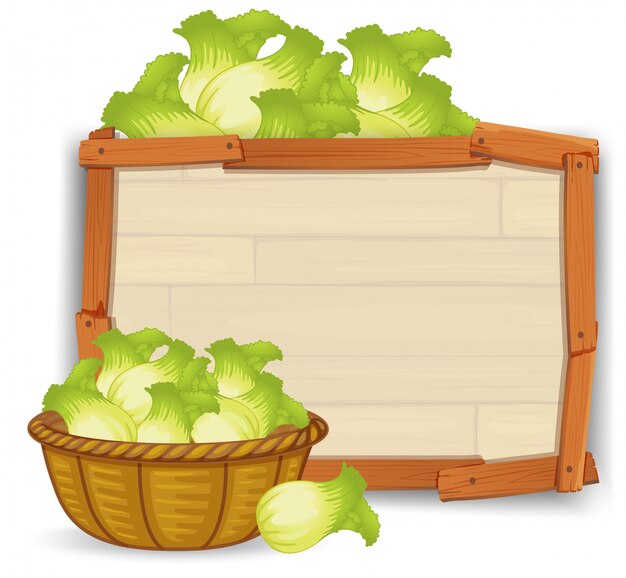 Una lechuga sobre tabla de madera