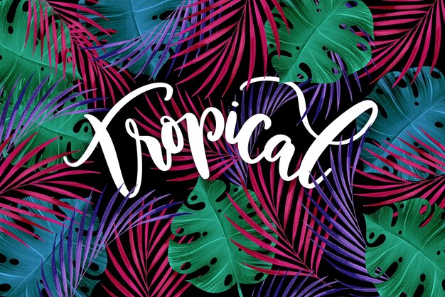 Letras de coloridas hojas tropicales