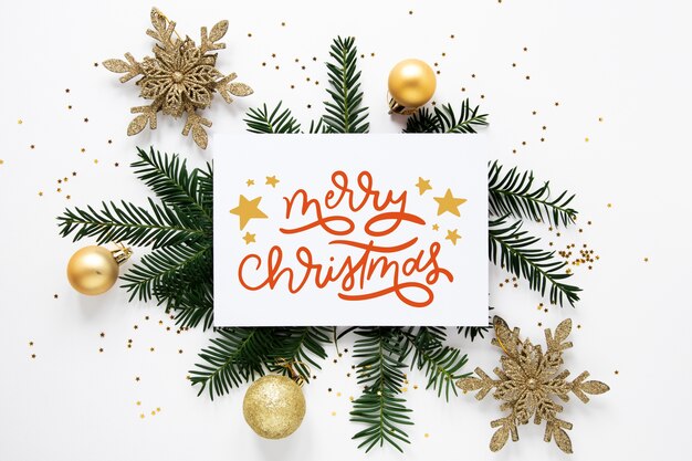 Letras de feliz navidad en foto con ramitas
