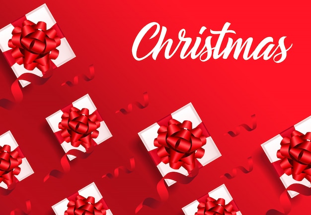 Vector gratuito letras de navidad sobre fondo rojo con patrón de cajas de regalo