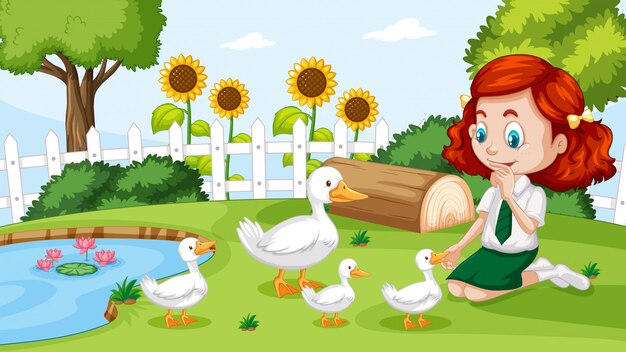 Linda chica jugando con pato