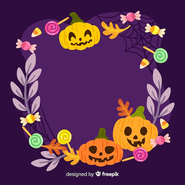 Vector gratuito lindo marco de halloween con calabazas