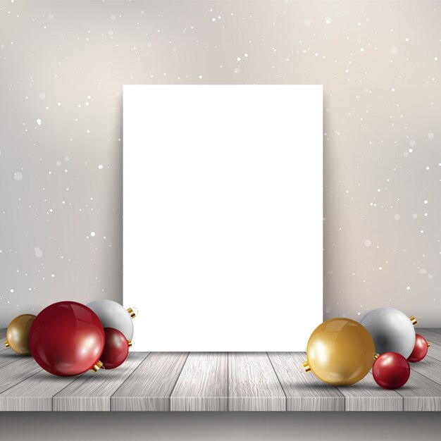 Lona en blanco en la mesa de madera con adornos de Navidad