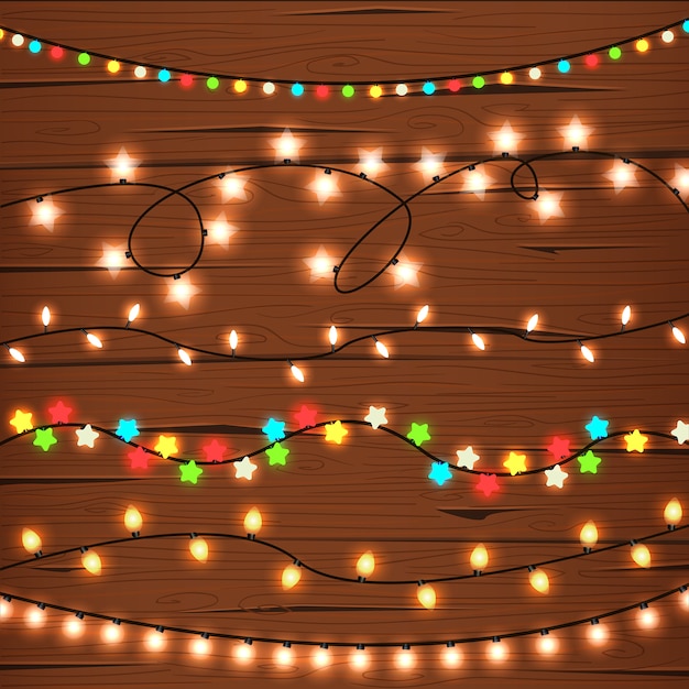 Vector gratuito luces de cadena en la pared de madera