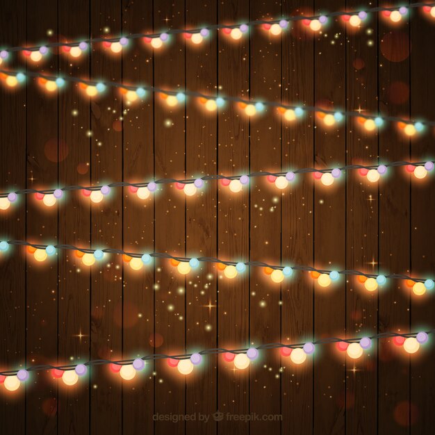 Luces de colores con un fondo de madera