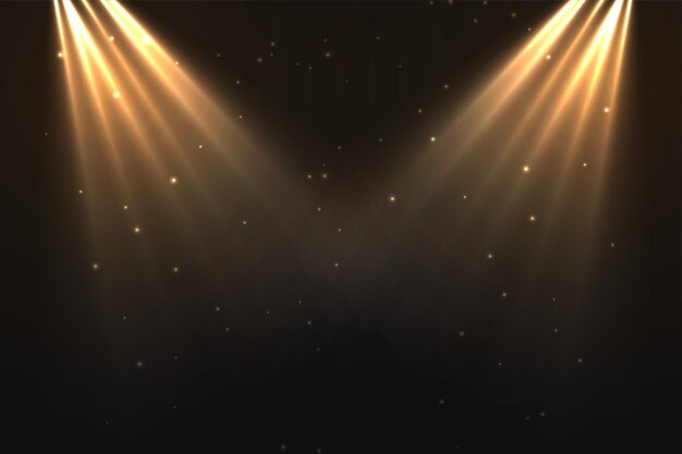 Luces de enfoque doradas con un fondo de polvo brillante