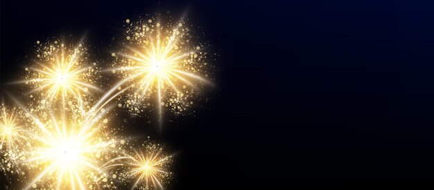 Luces de fuegos artificiales dorados sobre un fondo negro