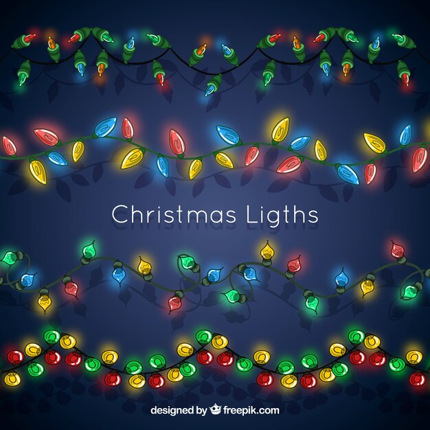 Luces de navidad brillantes sobre un fondo azul oscuro