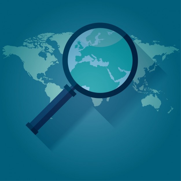 Lupa sobre mapa del mundo