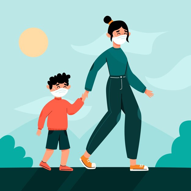 Madre y niño con máscaras al aire libre