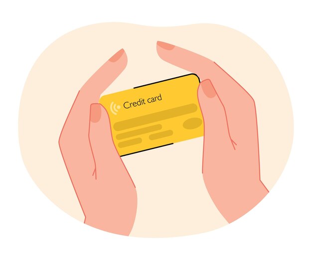 Manos humanas con tarjeta de crédito amarilla
