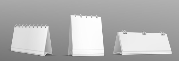 Vector gratuito mockup aislado blanco de calendario en espiral de escritorio en blanco