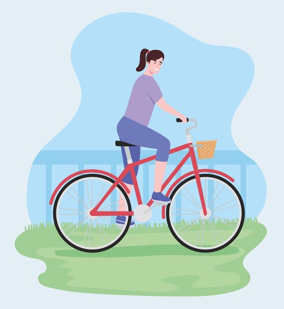 Mujer ciclista en paisaje