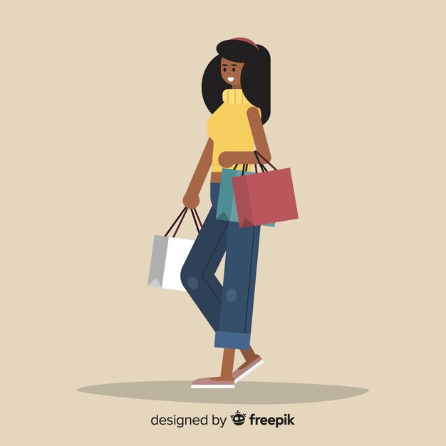 Mujer feliz llevando bolsas de la compra