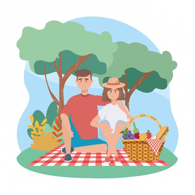 Mujer y hombre con sandwinch y uvas con manzana