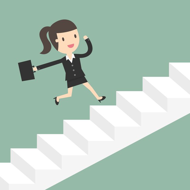 Mujer de negocios corriendo sobre unas escaleras