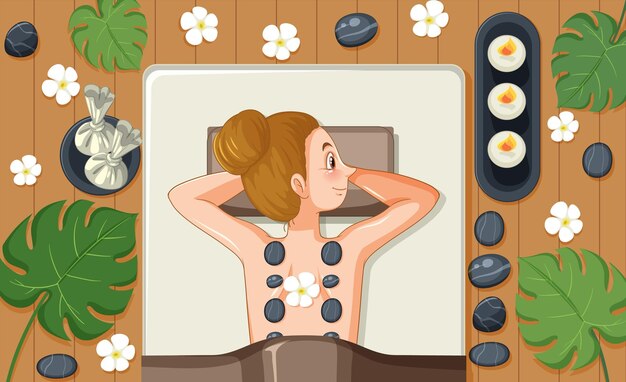 Mujer recibiendo masaje con piedras spa