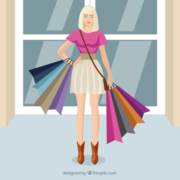 Mujer rubia con bolsas de la compra